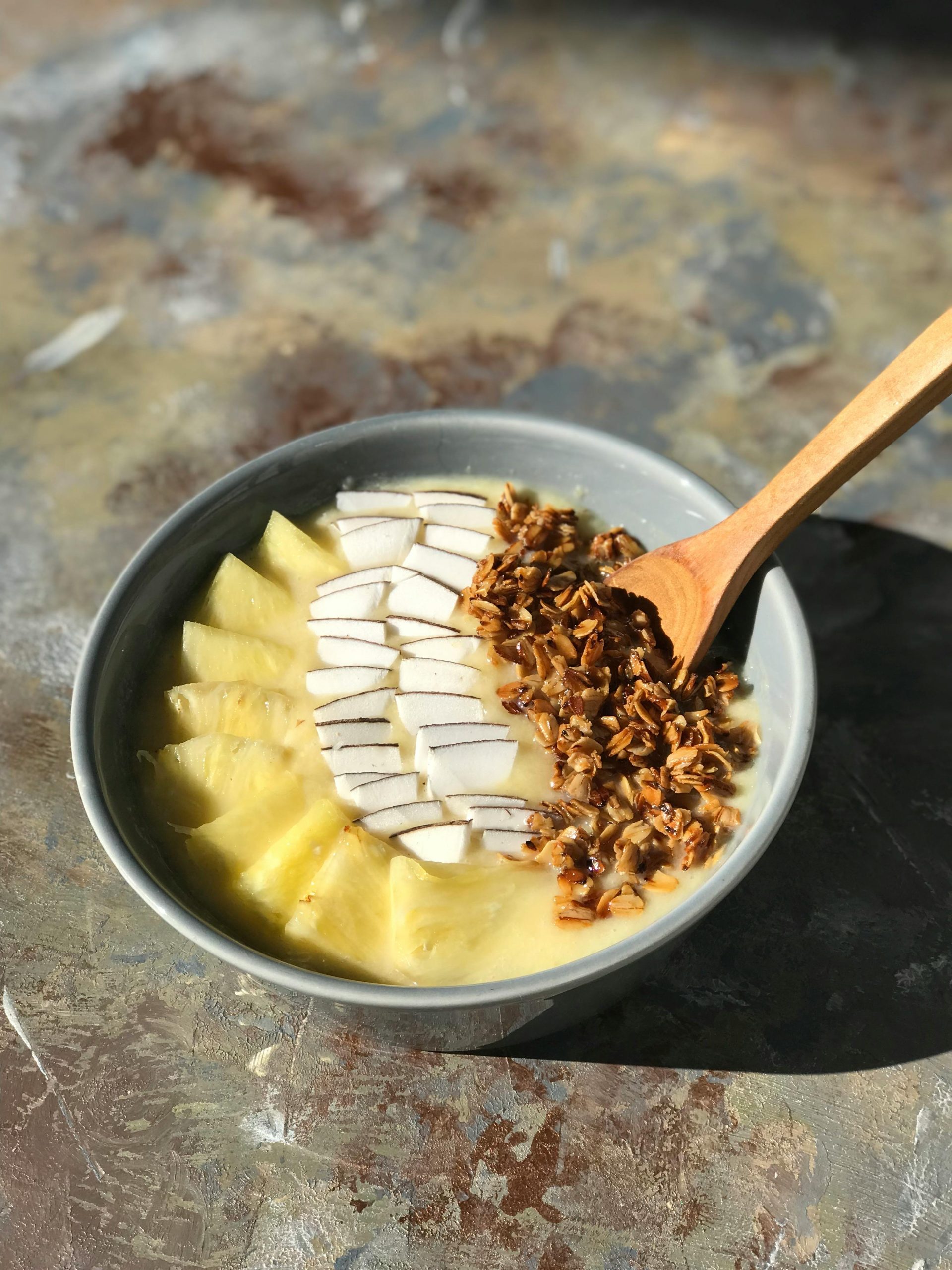 Delicious pineapple and coconut granola bowl, perfect for a nourishing breakfast.
